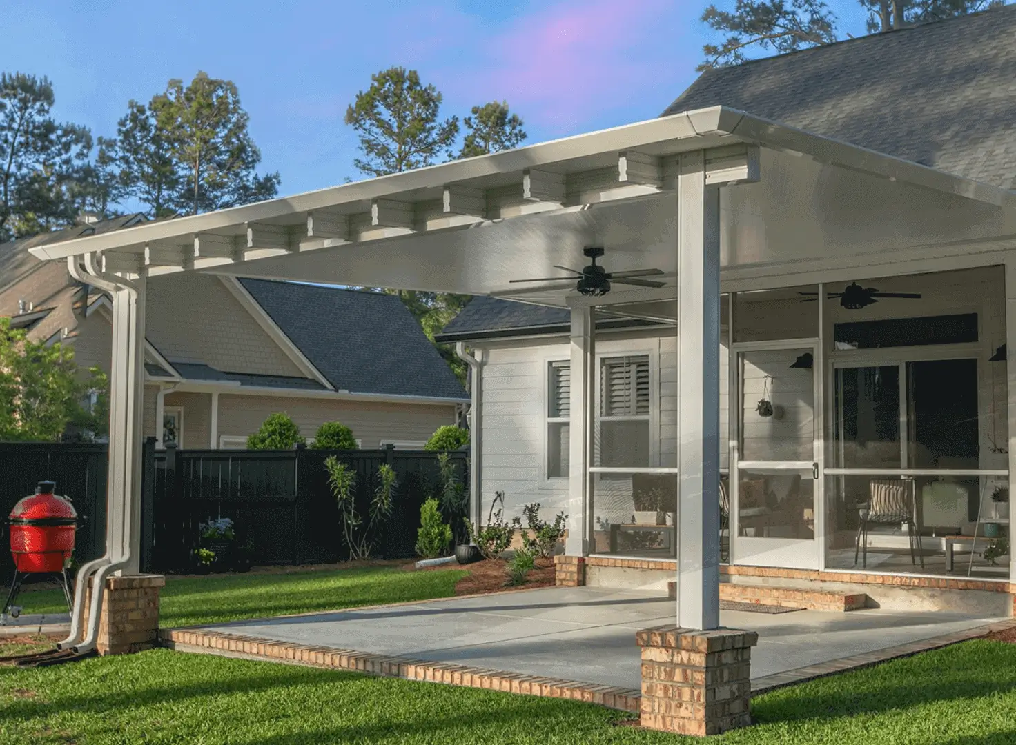 Backyard covered patio with ceiling fans